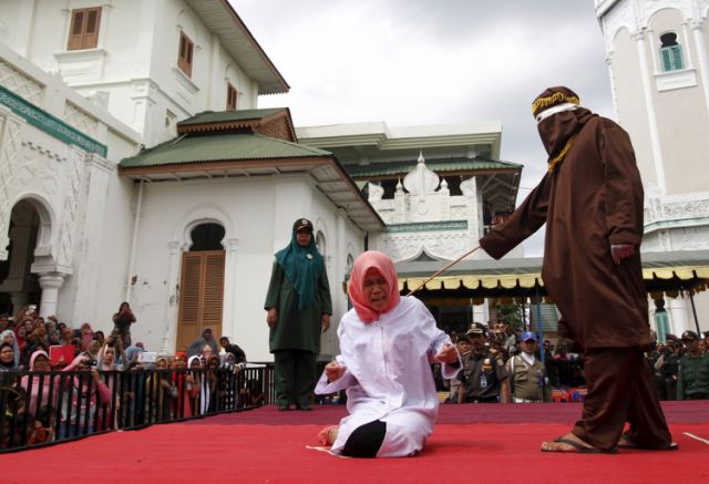 Indonesia: Unmarried Couple publicly caned for being "too close"