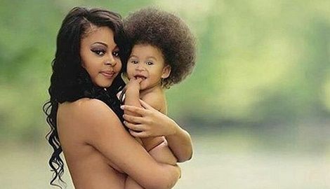 Trending: Totally Naked Lady Carrying Her Naked Son (PHOTO)